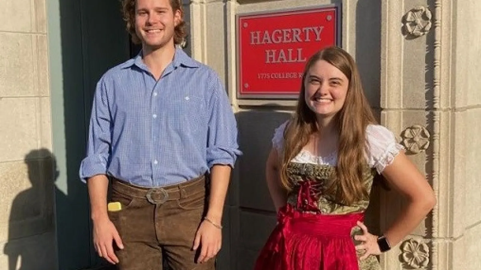 Gustav Grimm and Haley Grubb in Tracht September 2022 in front of Hagerty Hall