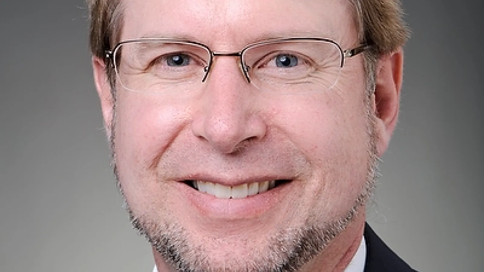 Mark L. Louden